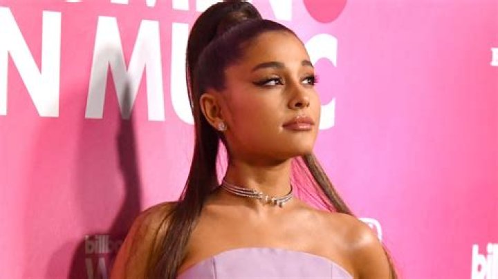 Find The Meaning Behind Ariana Grande's Signature Symbols