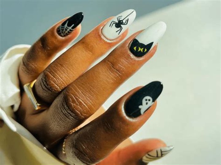 Spooktacular Black And White Halloween Nail Art