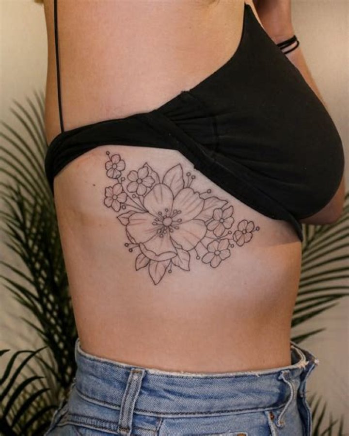 Stunning Floral Rib Tattoos: An Exquisite Art Form