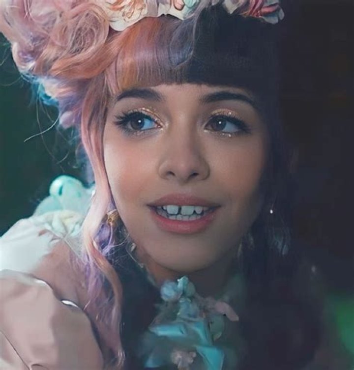 Unveiling Melanie Martinez's Enigmatic Smile: Discoveries And Insights